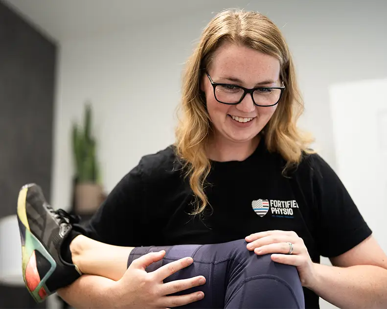 image of fortified physio logo sign with several people standing under it